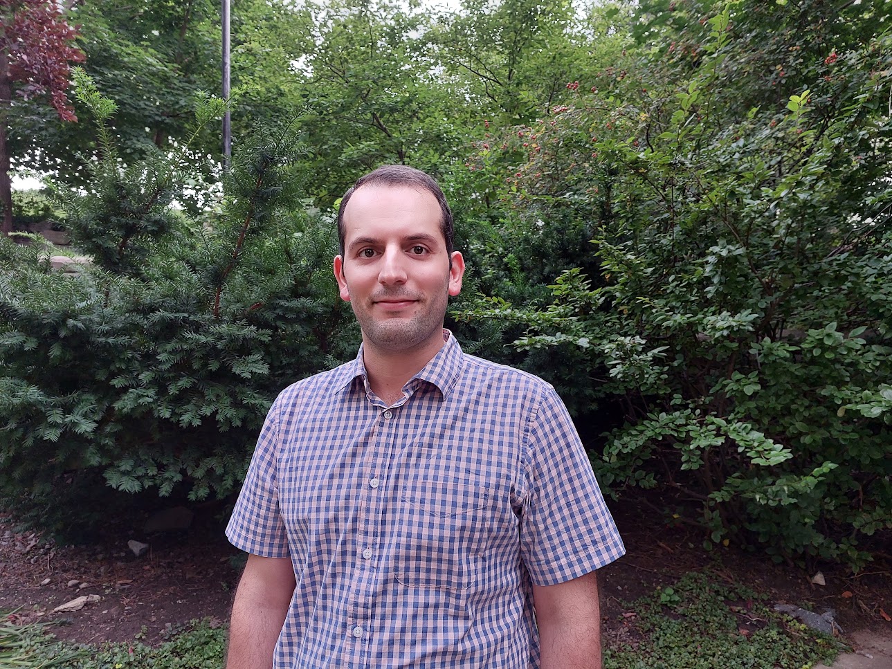 Portrait of Seyed Mohammad Hosseini outdoors